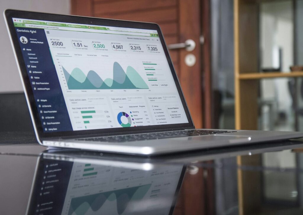 Laptop showing a sales and analytics dashboard